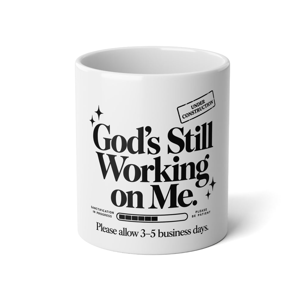 God's Still Working on Me Mug